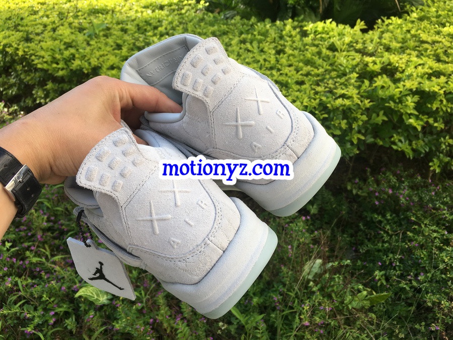 Kaws x Air Jordan 4 Creamy White